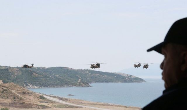 Turkish President Tayyip Erdogan watches a military exercise near Izmir, Turkey, June 9, 2022. Murat Cetinmuhurdar/PPO/Handout via REUTERS THIS IMAGE HAS BEEN SUPPLIED BY A THIRD PARTY. NO RESALES. NO ARCHIVES