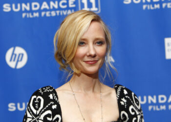 Actress Anne Heche poses at the premiere of "Cedar Rapids" during the 2011 Sundance Film Festival in Park City, Utah on Sunday, Jan. 23, 2011. (AP Photo/Danny Moloshok)