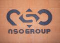 A logo adorns a wall on a branch of the Israeli NSO Group company, near the southern Israeli town of Sapir, Tuesday, Aug. 24, 2021. Nine activists from Bahrain had their iPhones hacked by advanced spyware made by NSO Group, the world’s most infamous hacker-for-hire firm, Citizen Lab at the University of Toronto, a cybersecurity watchdog reported on Tuesday, Aug. 24, 2021. The watchdog said NSO Group’s Pegasus malware successfully hacked the phones between June 2020 and February 2021. (AP Photo/Sebastian Scheiner)