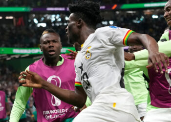 Ghana's Mohammed Kudus celebrates with teammates after scoring his sides third goal during the World Cup group H soccer match between South Korea and Ghana, at the Education City Stadium in Al Rayyan , Qatar, Monday, Nov. 28, 2022. (AP Photo/Luca Bruno)